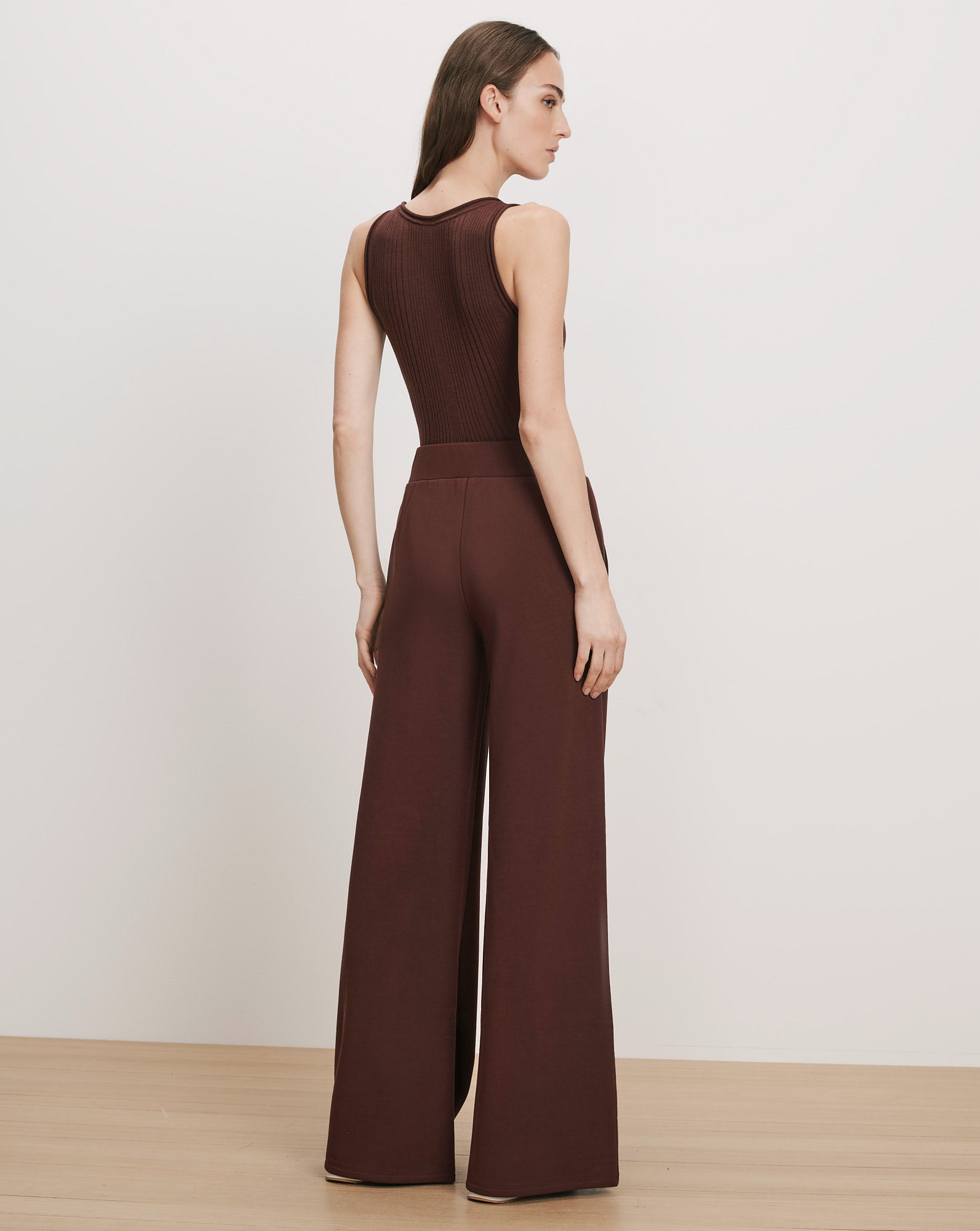 Veronica Beard Brown ribbed tank top and wide-leg pants.
