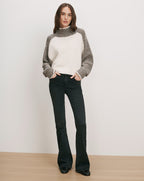 Veronica Beard White and gray knit sweater, black flared jeans