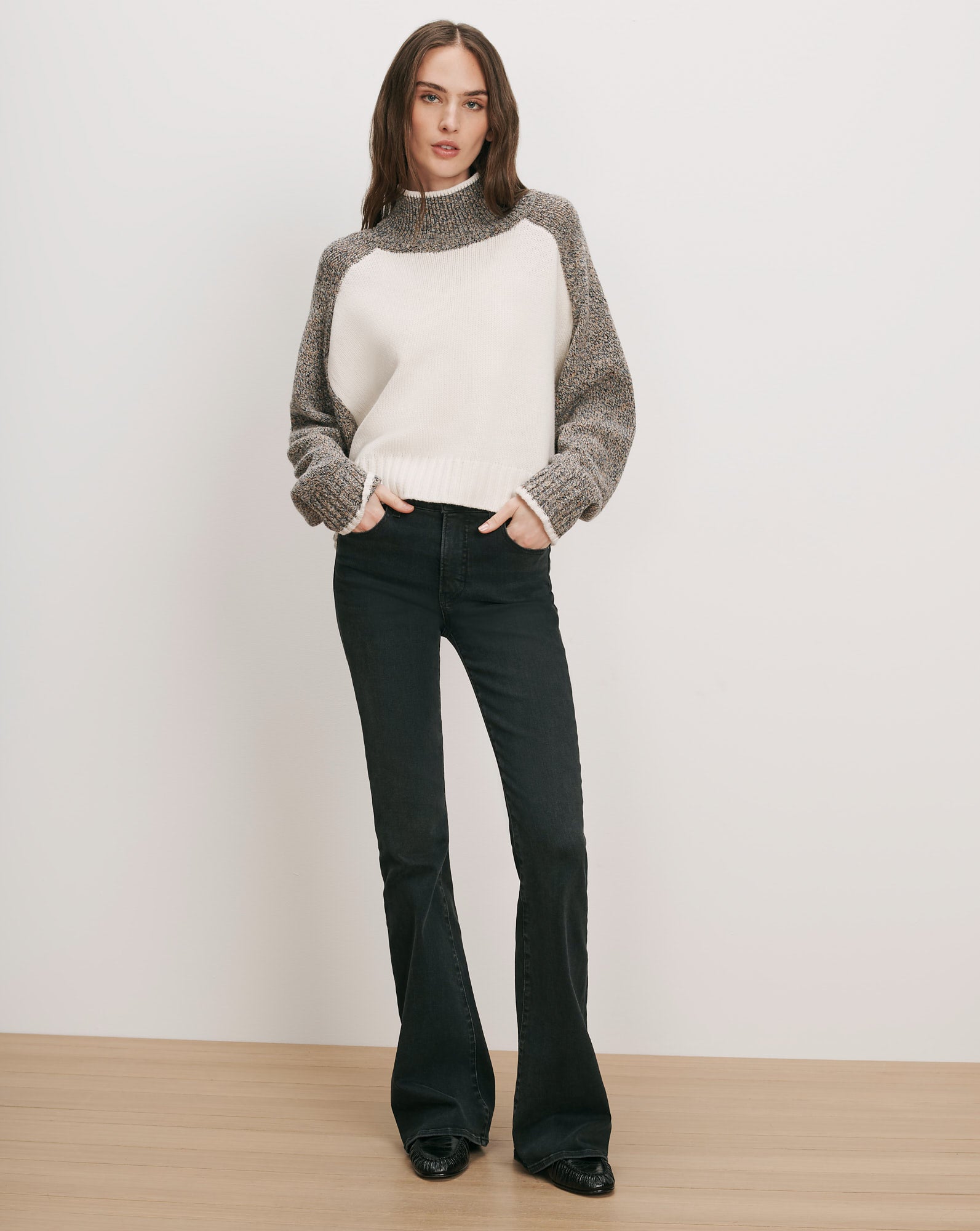 Veronica Beard White and gray knit sweater, black flared jeans