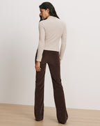 Veronica Beard Beige ribbed long-sleeve top and brown corduroy pants.