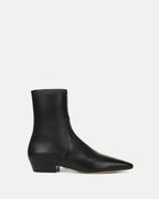 Veronica Beard Black leather ankle boots with pointed toe.