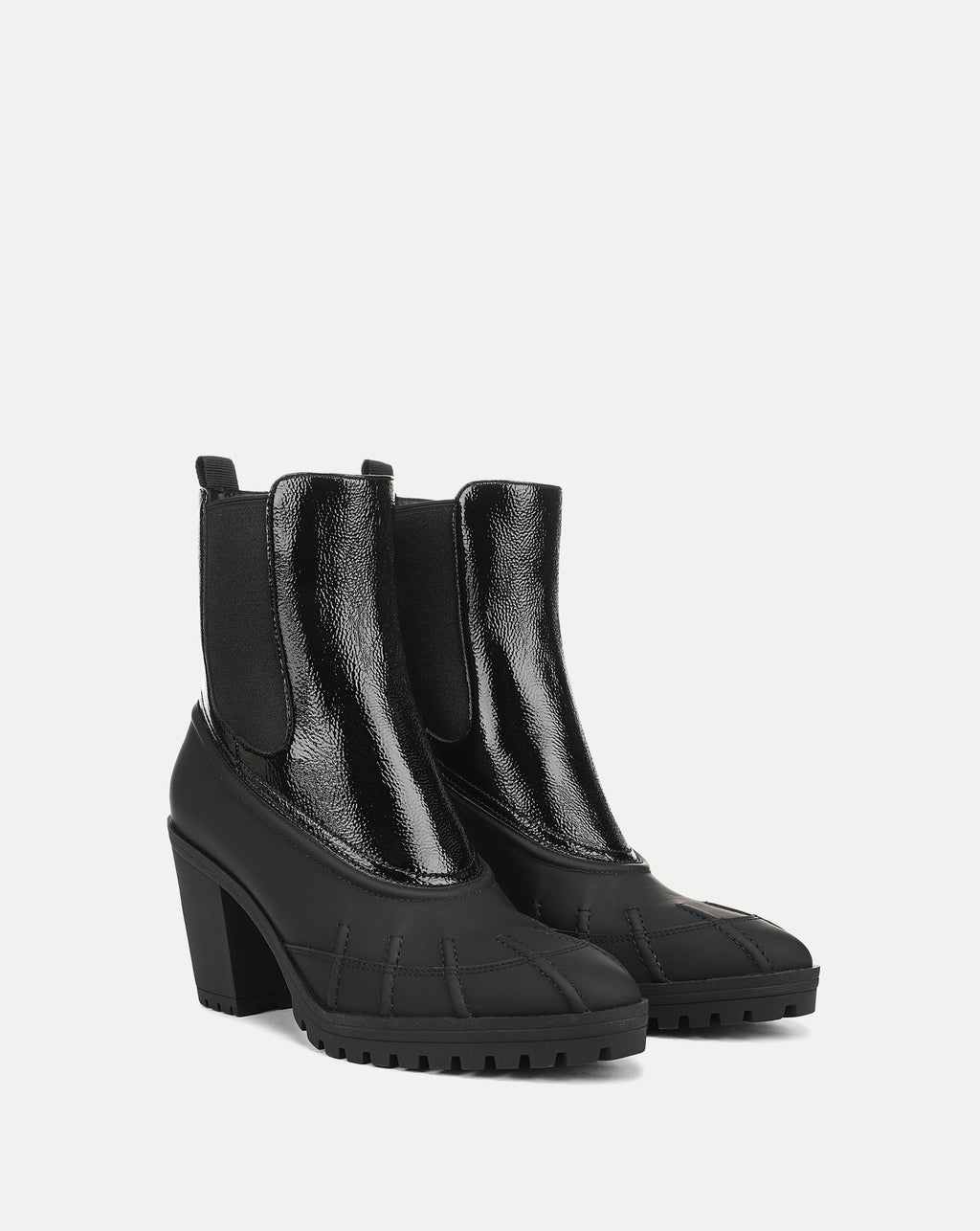 Veronica Beard Black patent leather and rubber heeled boots.
