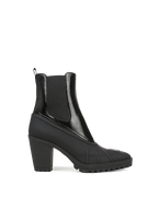 Veronica Beard Black heeled boot with shiny patent leather upper.