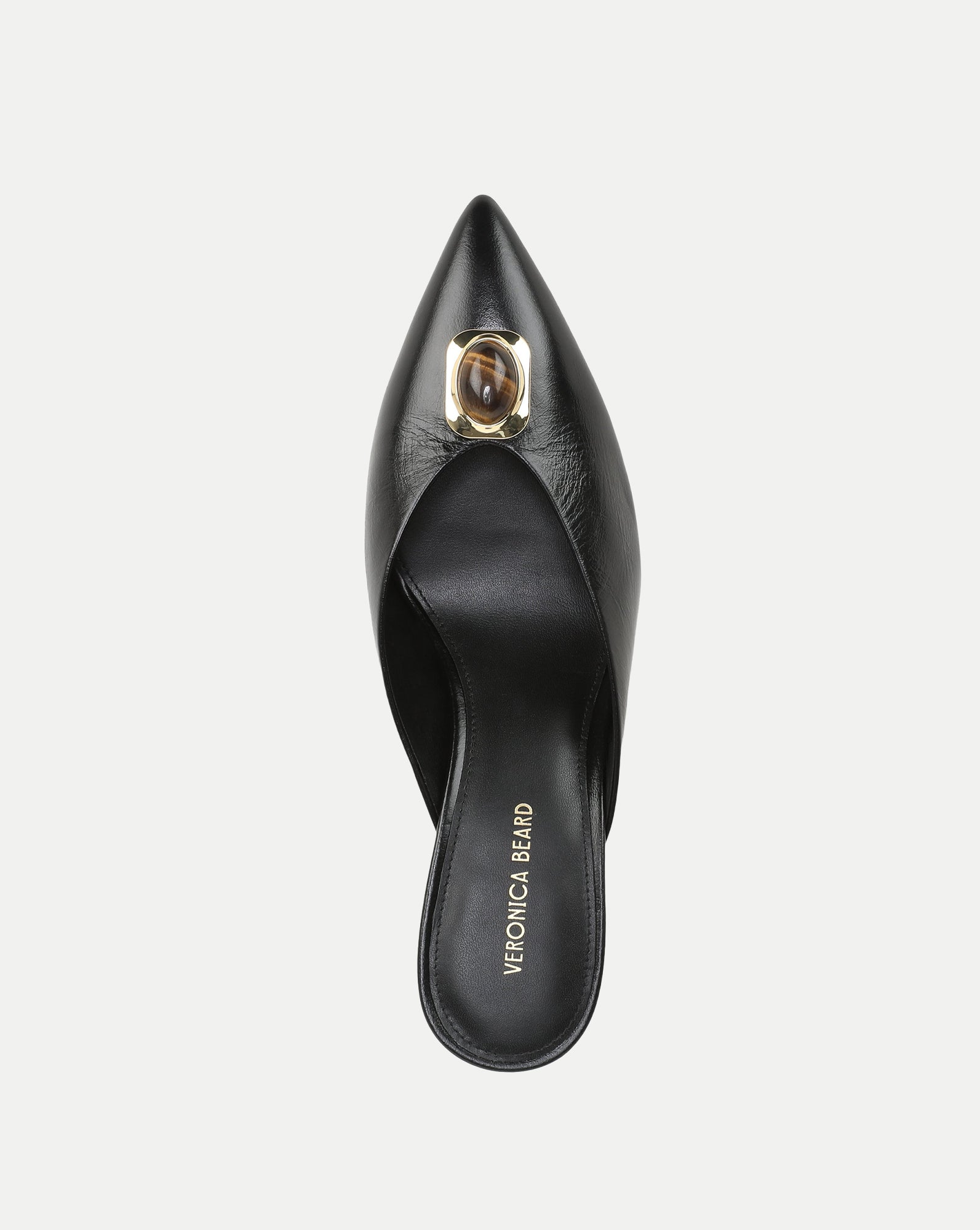 Veronica Beard Black leather pointed-toe mule with amber stone detail.