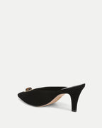 Veronica Beard Black suede mule with tortoise shell buckle.