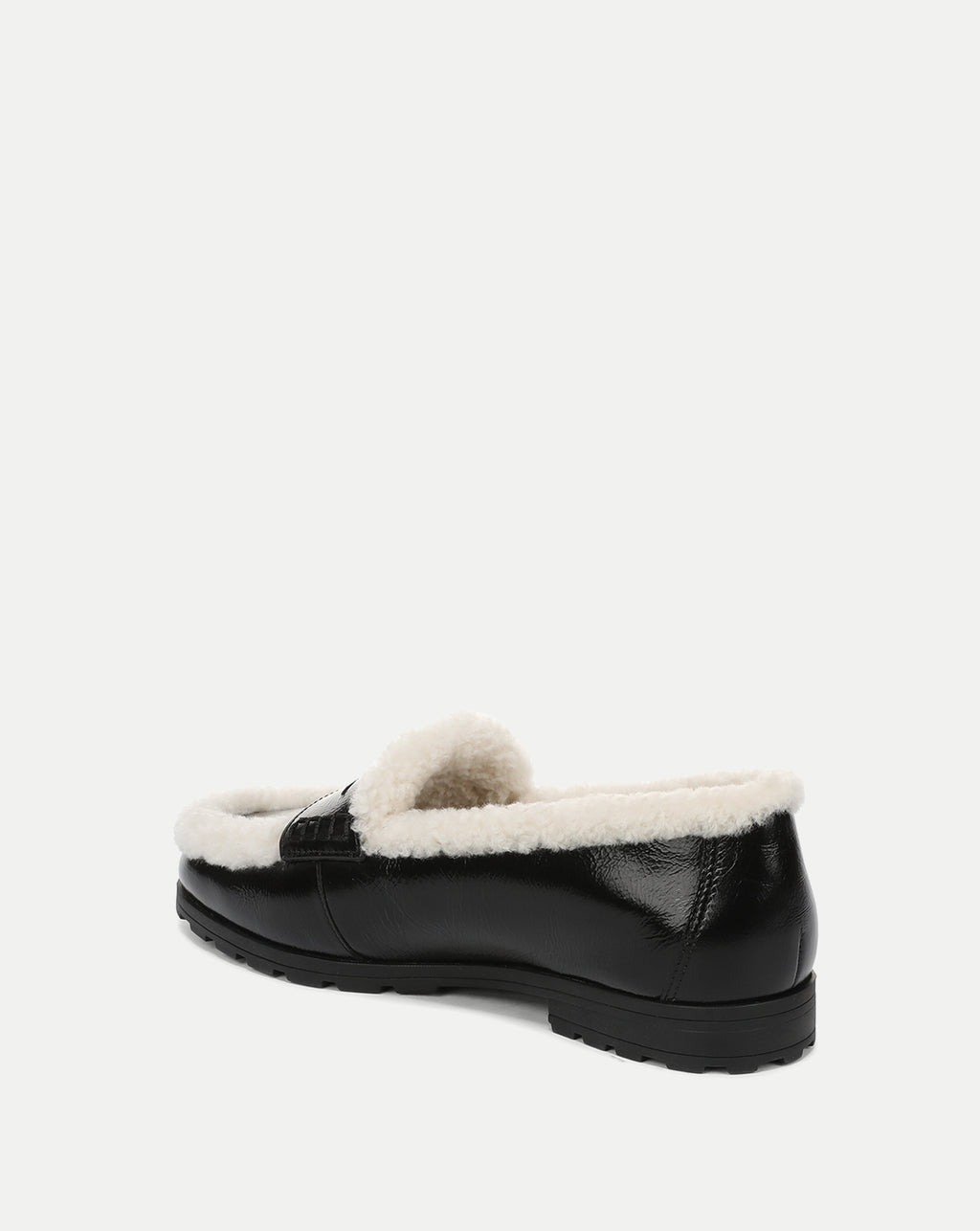 Veronica Beard Black patent leather shearling-lined slip-on loafer.