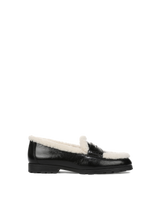 Veronica Beard Black leather loafer with white shearling trim.