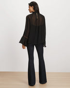 Veronica Beard Black chiffon blouse with flared sleeves and trim.