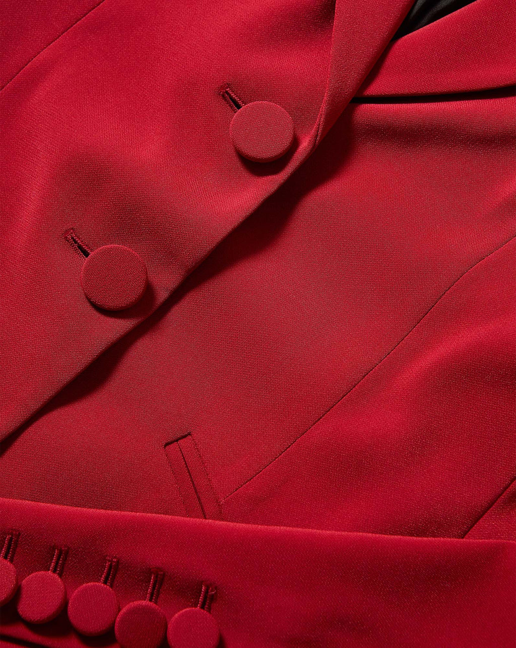 Veronica Beard Red blazer with structured collar and buttons.