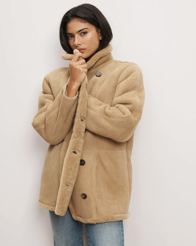 Veronica Beard Beige shearling coat with oversized buttons and pockets.
