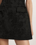 Veronica Beard Black floral jacquard mini skirt with pockets.