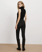 Veronica Beard Black sleeveless turtleneck and floral embossed pants.