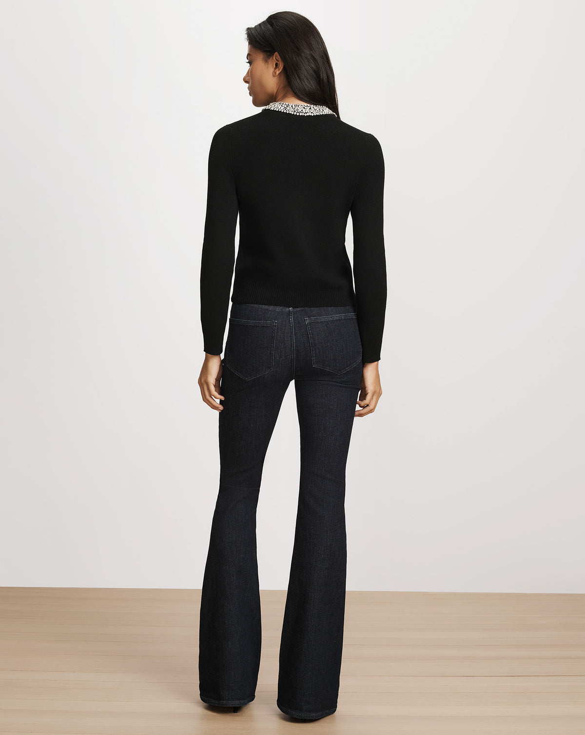 Veronica Beard Black long-sleeve sweater with embellished collar.