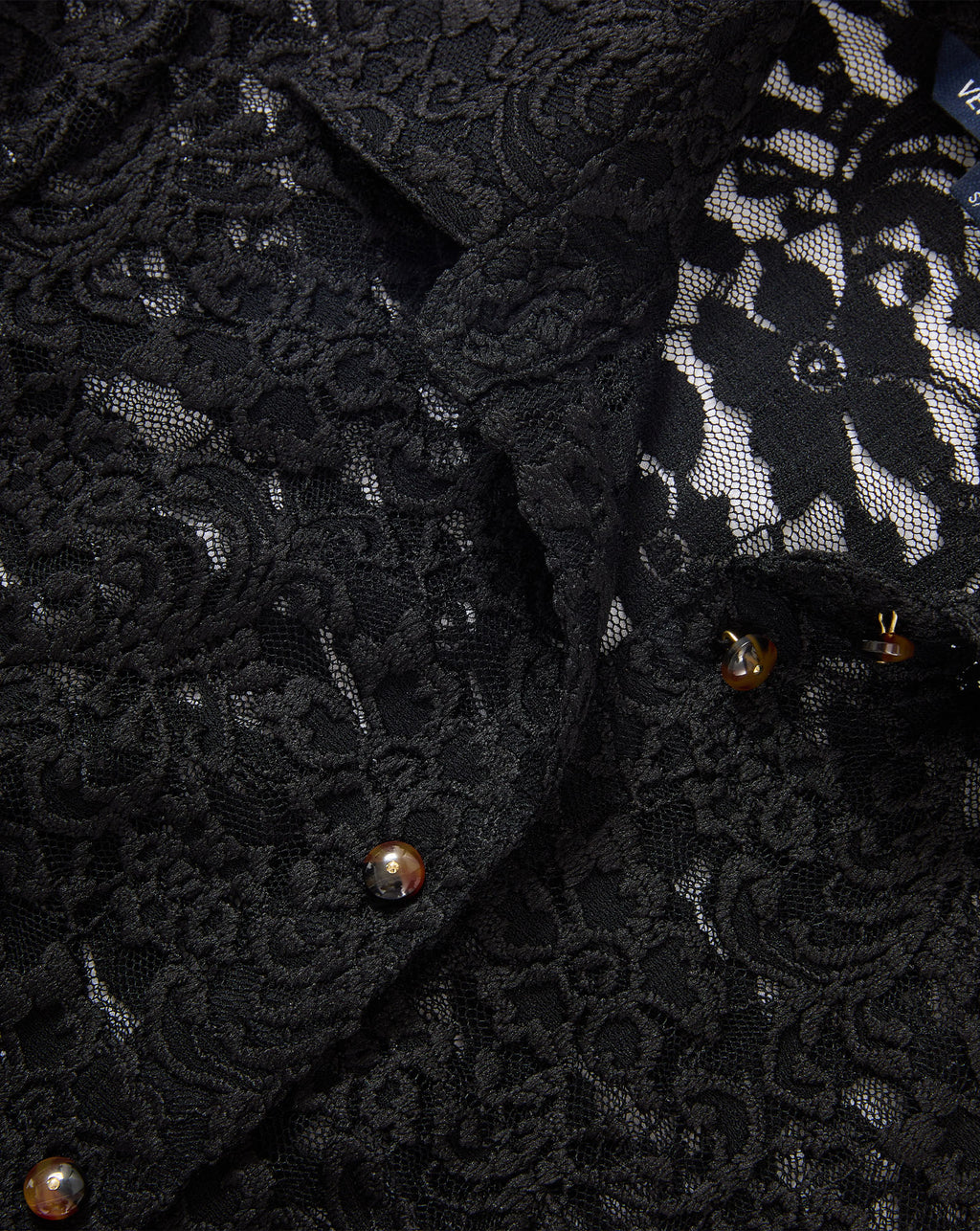 Veronica Beard Black lace shirt with tortoiseshell buttons.