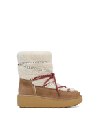 Veronica Beard Brown suede shearling boot with red laces.