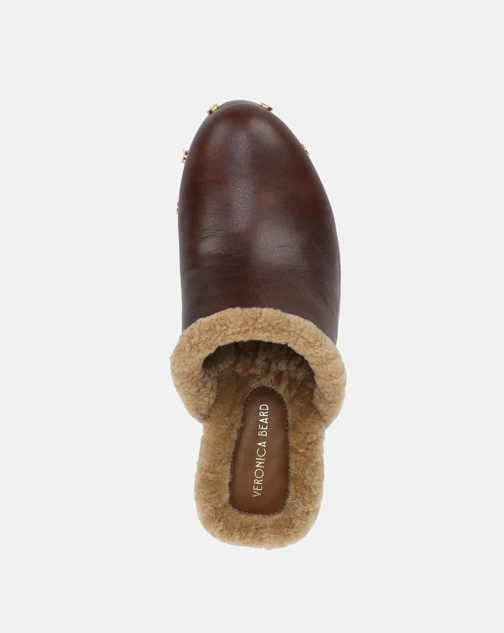 Veronica Beard Brown leather shearling-lined slip-on mule with studs.