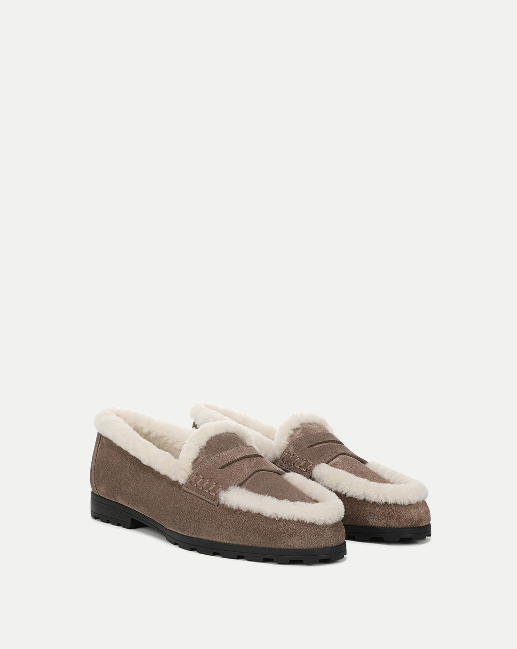 Veronica Beard Brown suede shearling-lined slip-on penny loafers.