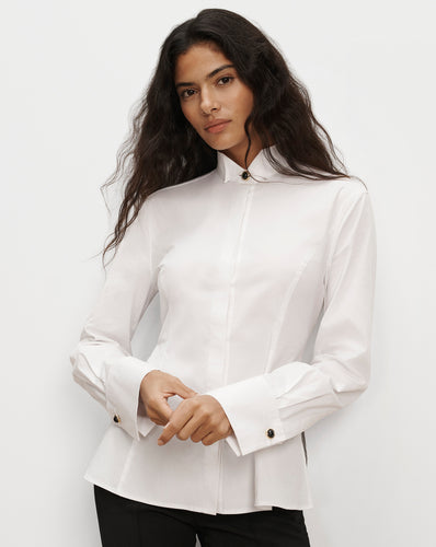 Veronica Beard White button-up shirt with long flared cuffs.