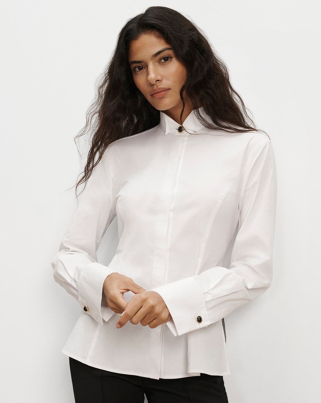 Veronica Beard White button-up shirt with long flared cuffs.