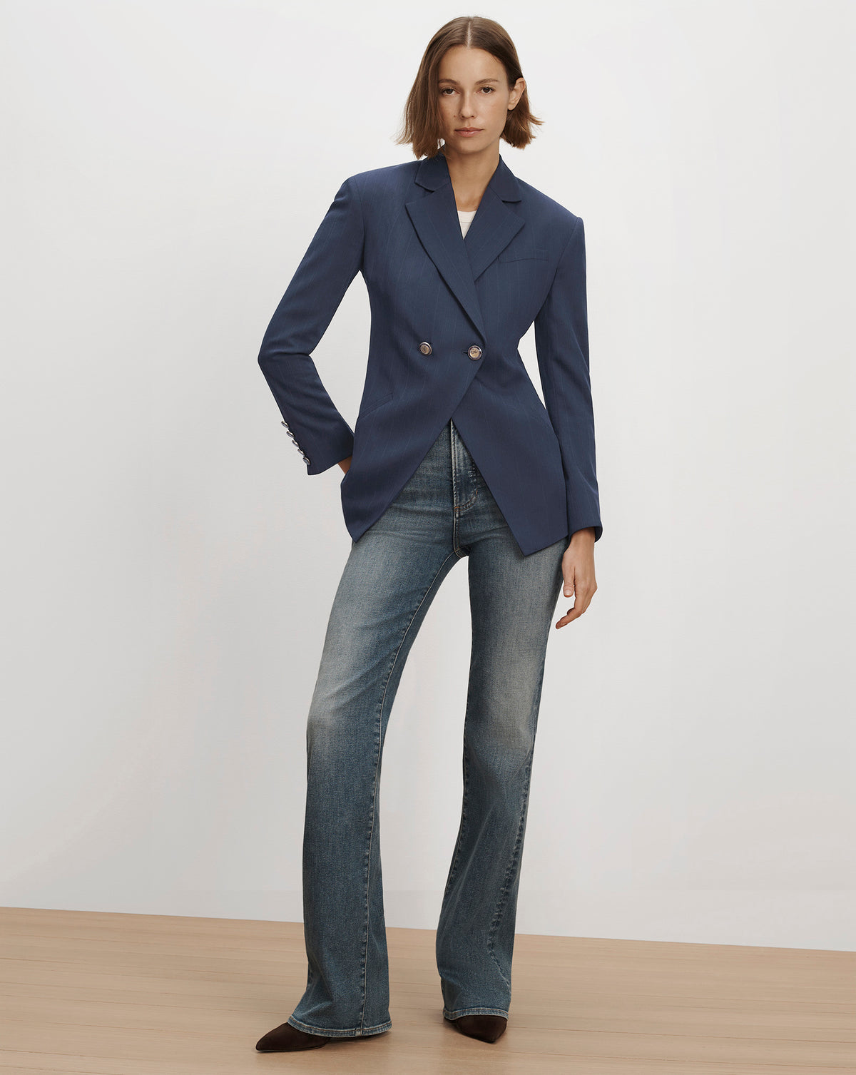 Veronica Beard Blue double-breasted tailored blazer with button details.