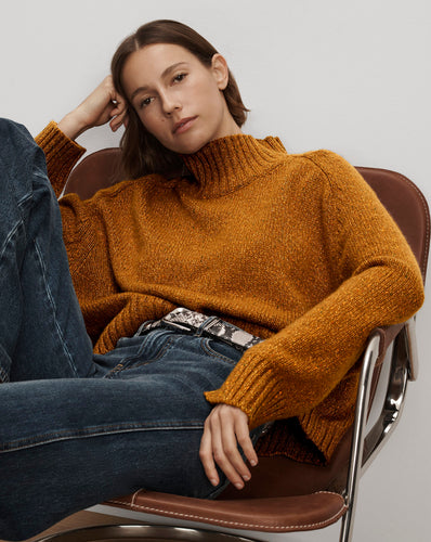 Veronica Beard Mustard turtleneck sweater in fuzzy knit material.