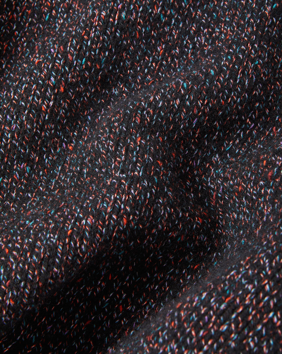 Veronica Beard Black speckled knit fabric with colorful flecks.