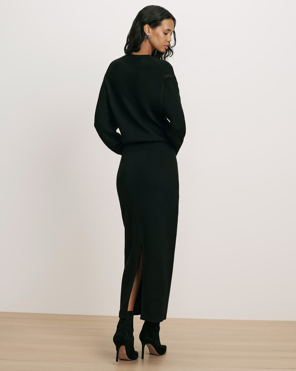 Veronica Beard Black knit sweater and midi skirt set.