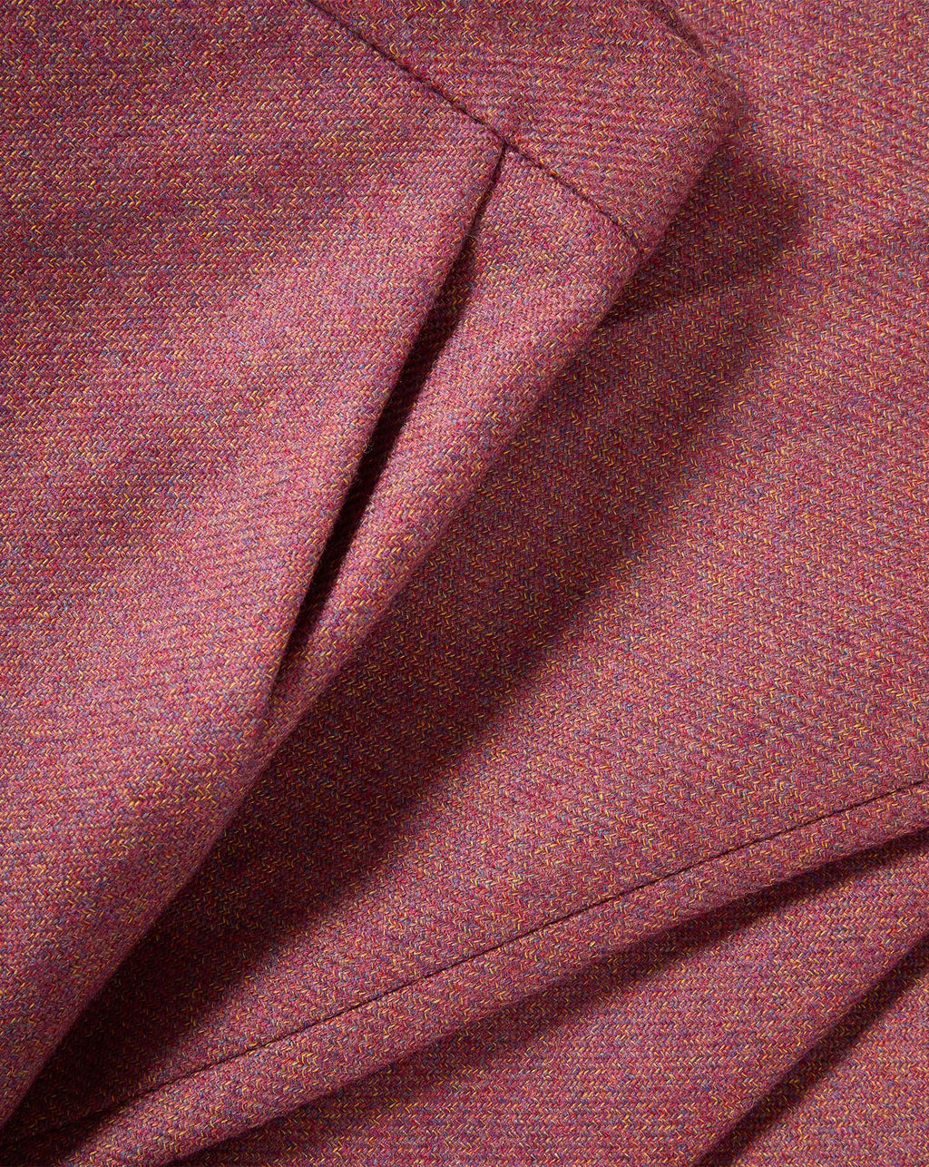 Veronica Beard Red tweed trousers with pleated detail.