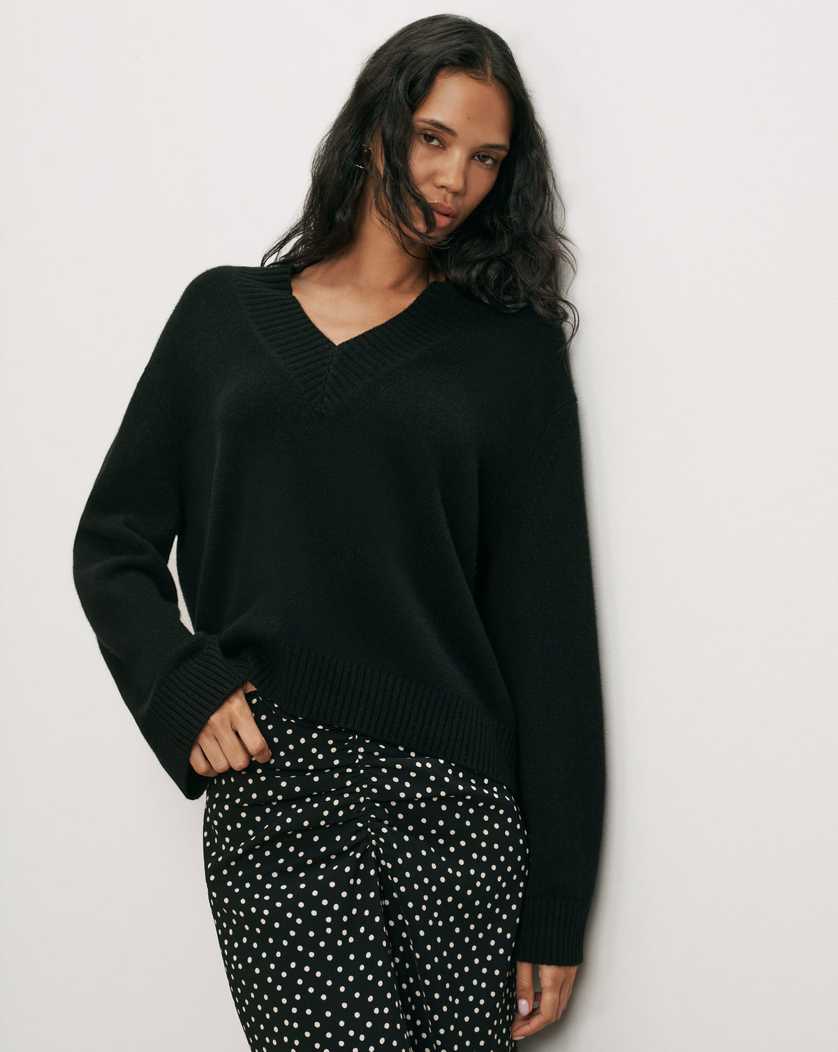 Veronica Beard Black v-neck knit sweater in relaxed silhouette.