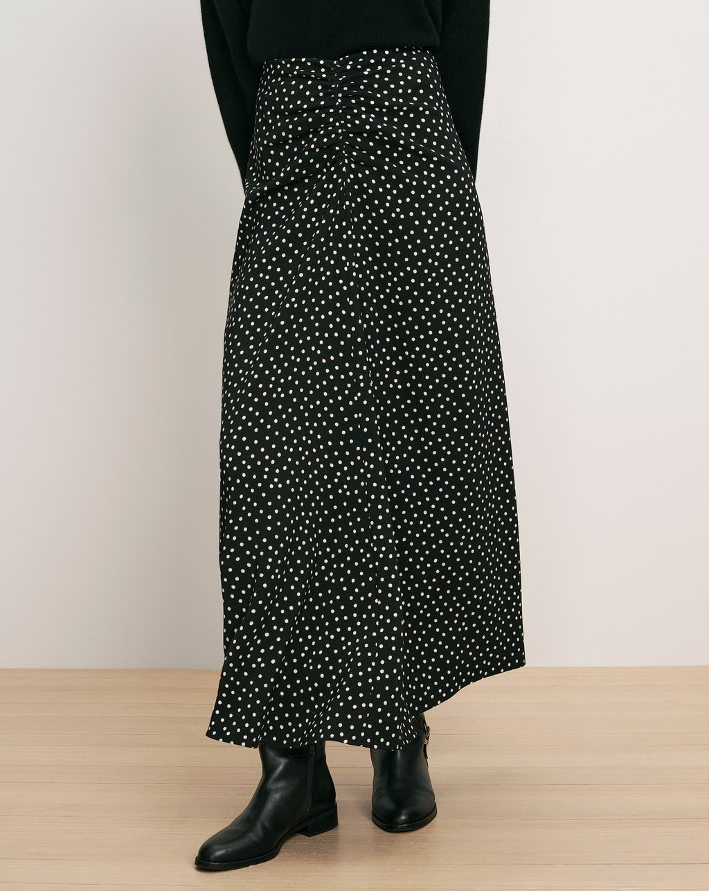Veronica Beard Black polka-dot maxi skirt with gathered front detail.