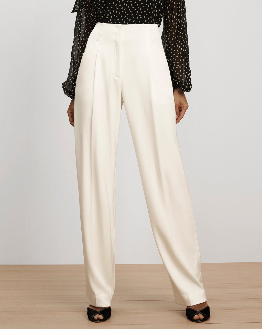 Veronica Beard White pleated wide-leg trousers in smooth fabric.