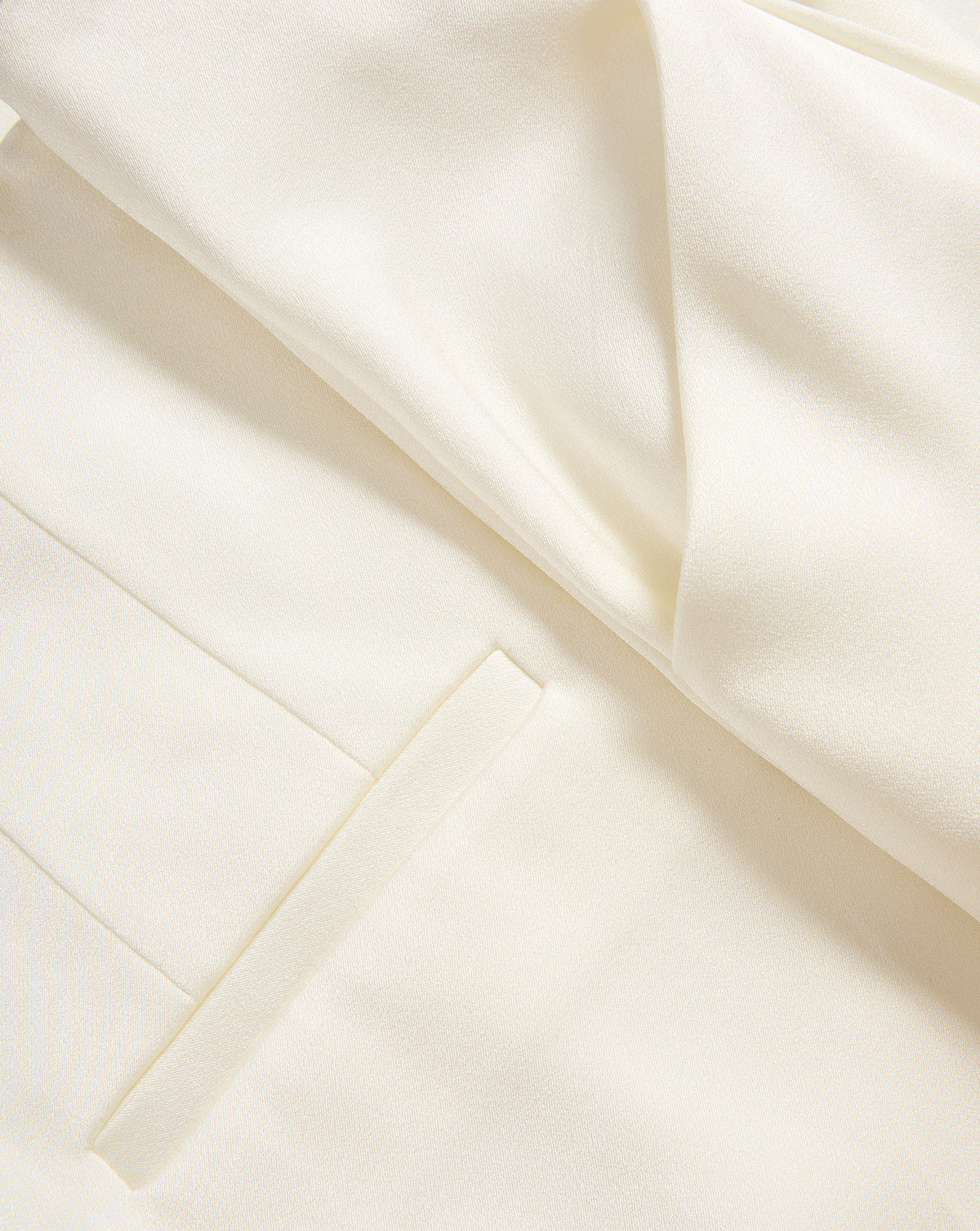 Veronica Beard White tailored trousers with front pocket detail.
