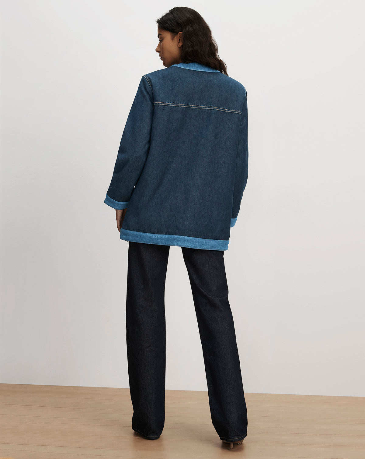 Veronica Beard Blue denim jacket and dark jeans.