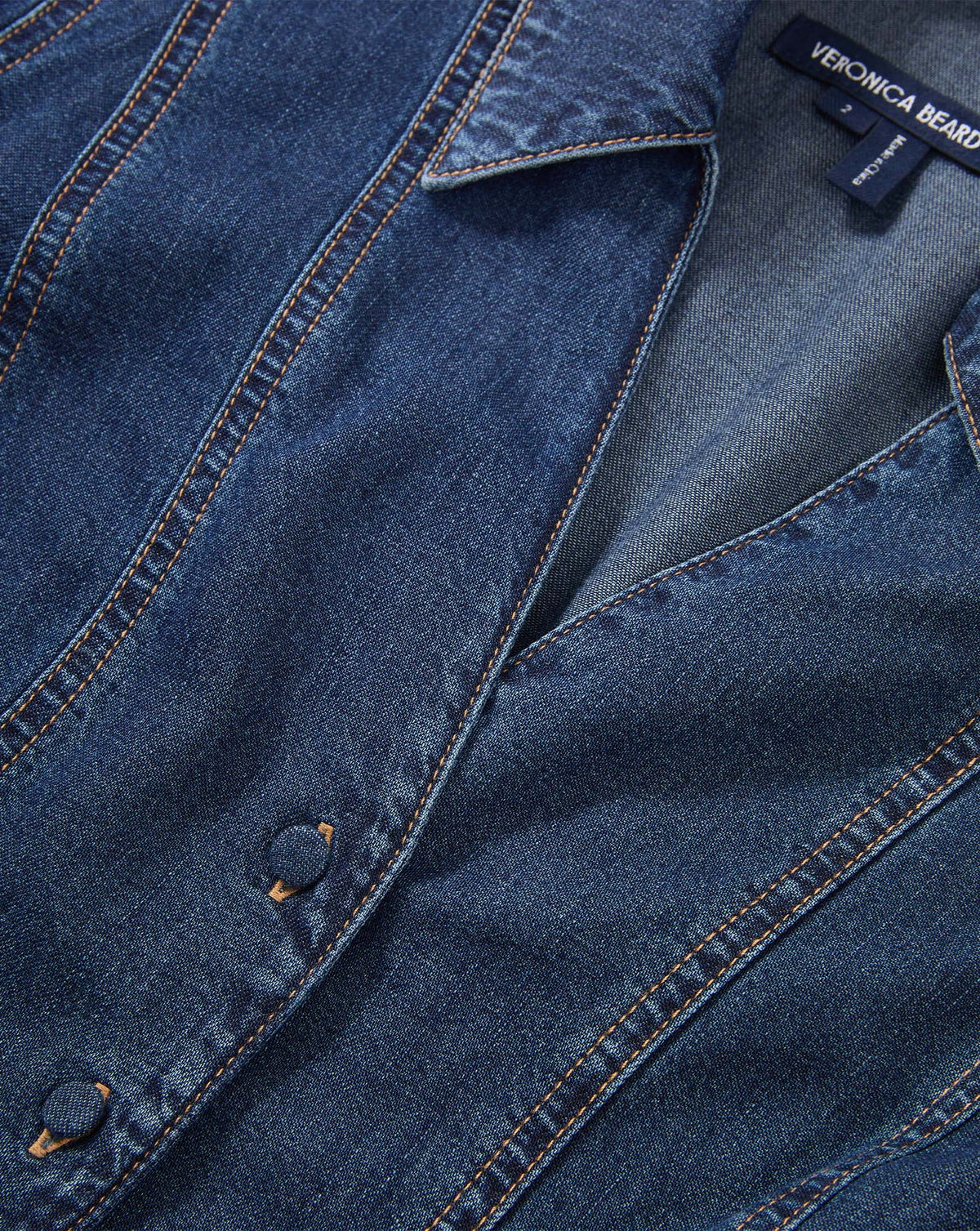 Veronica Beard Blue denim button-down vest with contrast stitching.