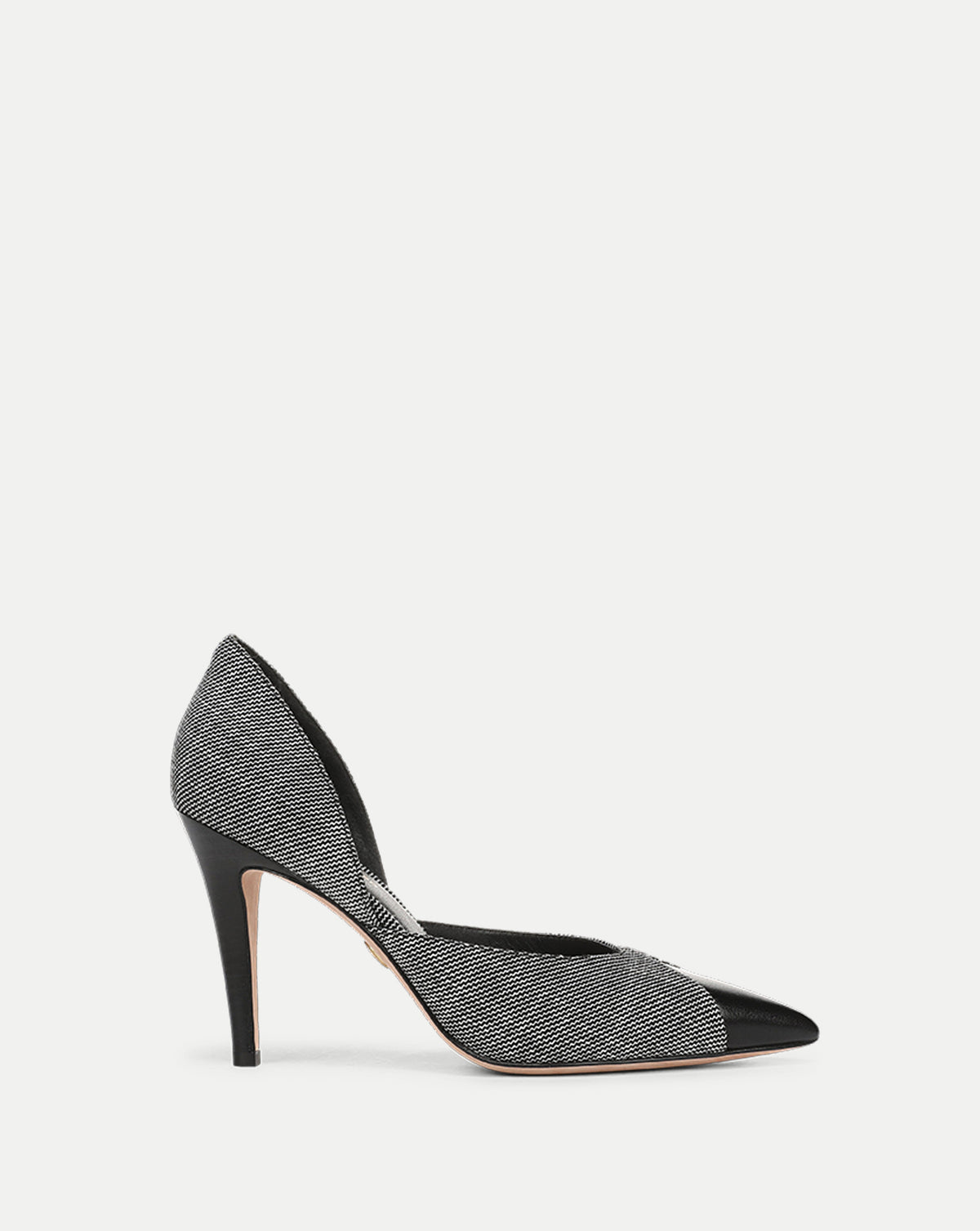 Veronica Beard Black and white tweed pointed-toe stiletto pump.