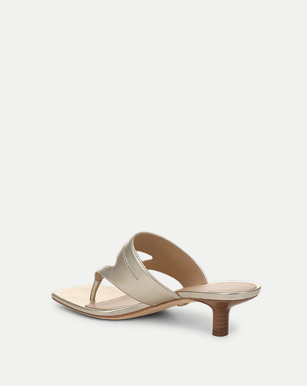 Veronica Beard Gold metallic thong mule with stiletto heel.