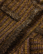 Veronica Beard Brown metallic tweed fabric texture with shimmering details.