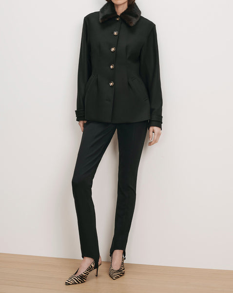 Veronica Beard Black tailored jacket with fur collar and gold buttons.