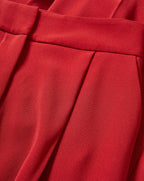 Veronica Beard Red pleated trousers with a fitted waistband.