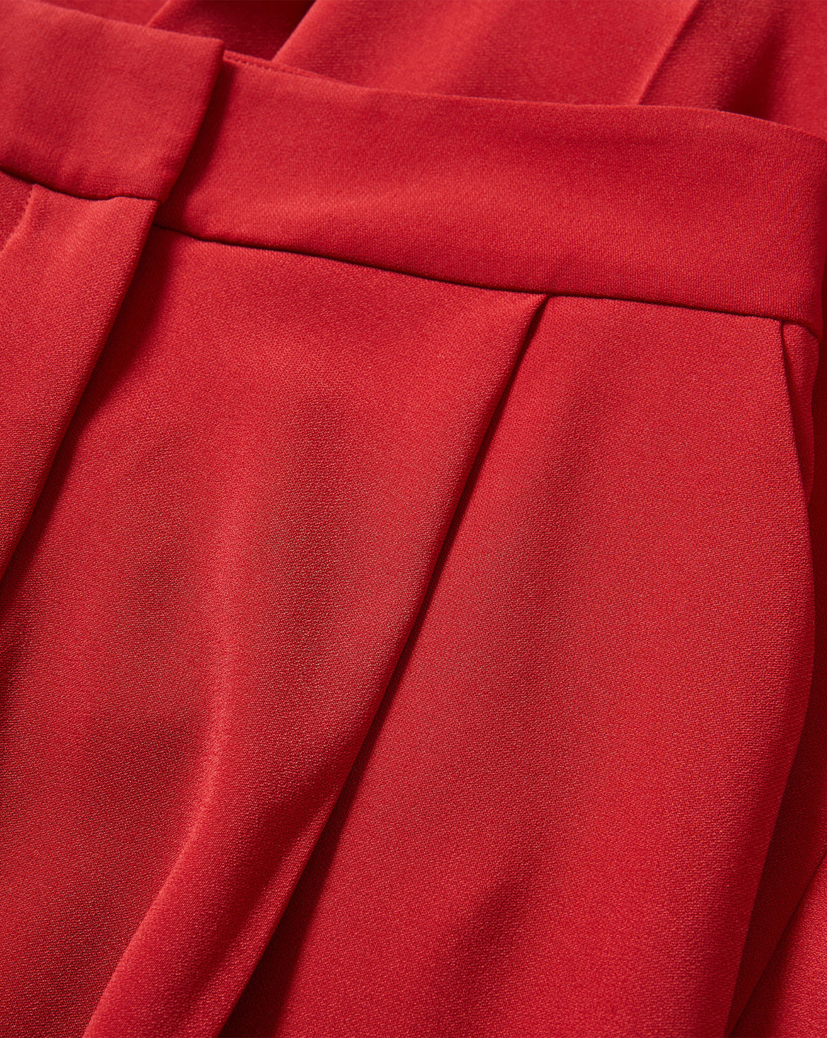 Veronica Beard Red pleated trousers with a fitted waistband.