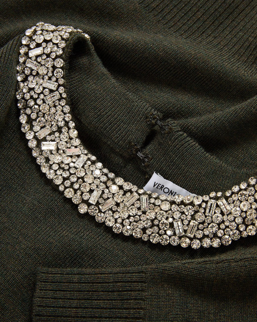 Veronica Beard Green knitted sweater with heavily embellished rhinestone collar.
