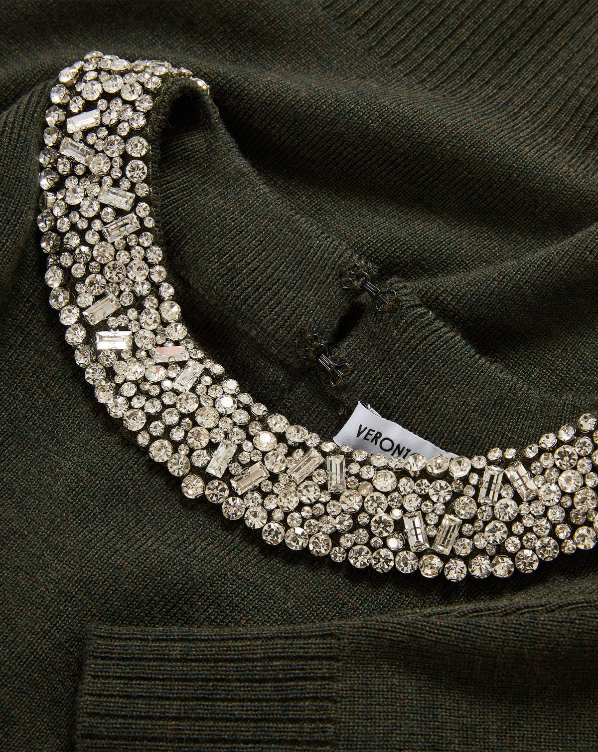 Veronica Beard Green knitted sweater with heavily embellished rhinestone collar.