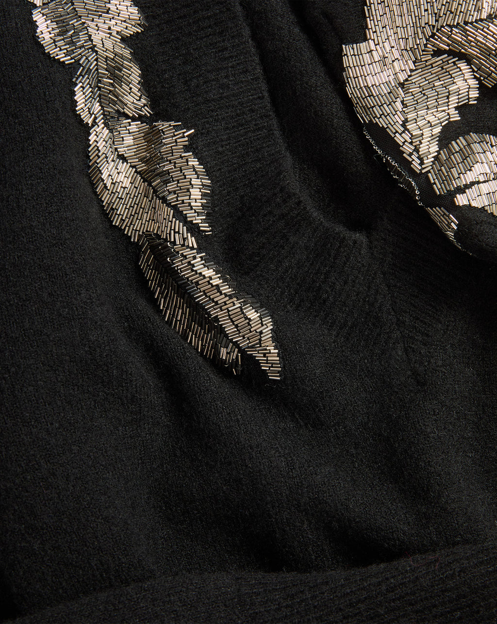 Veronica Beard Black knit sweater with silver beaded embroidery.