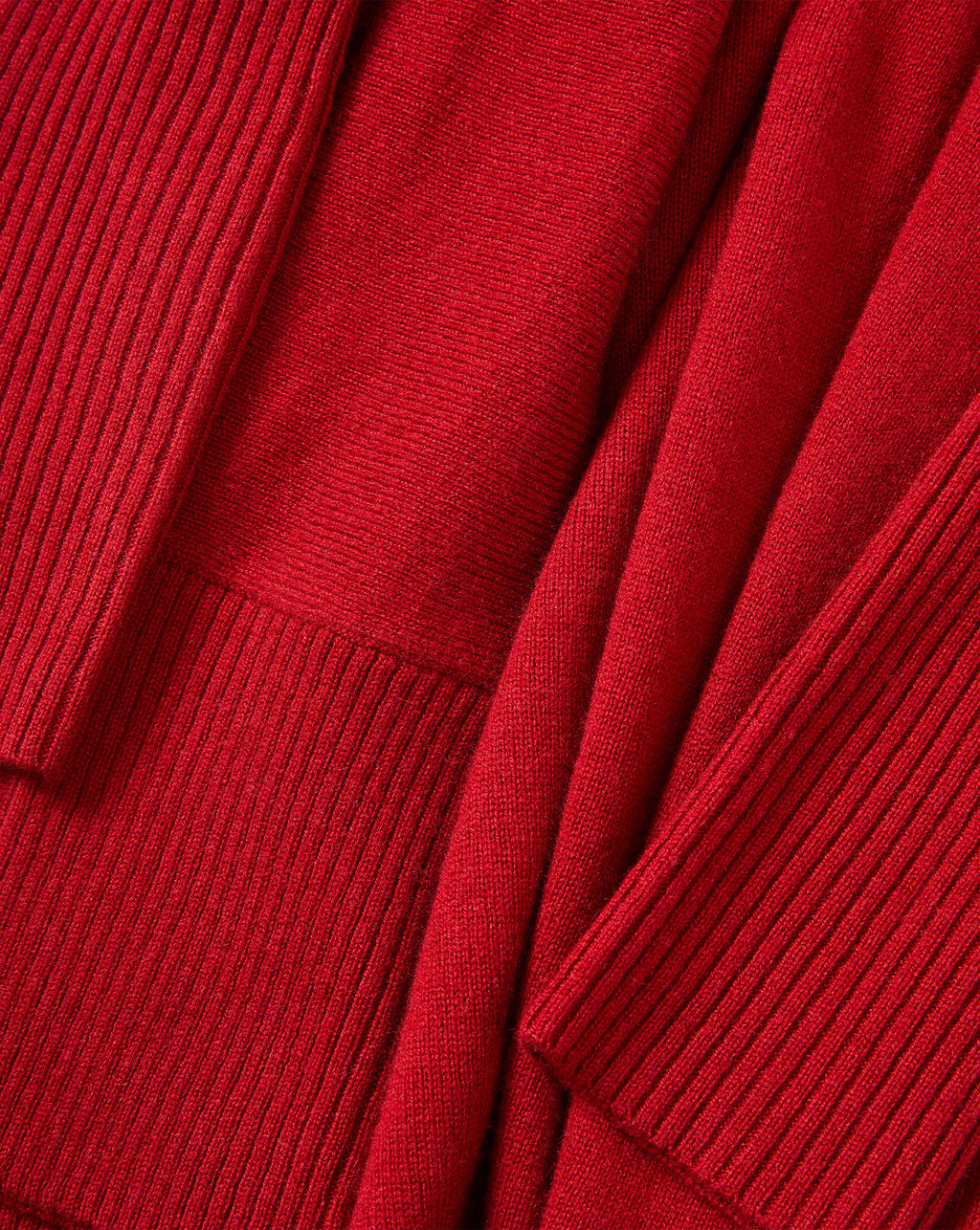 Veronica Beard Red knit cardigan with ribbed trim.
