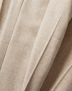 Veronica Beard Beige wool pleated trousers with sharp creases.