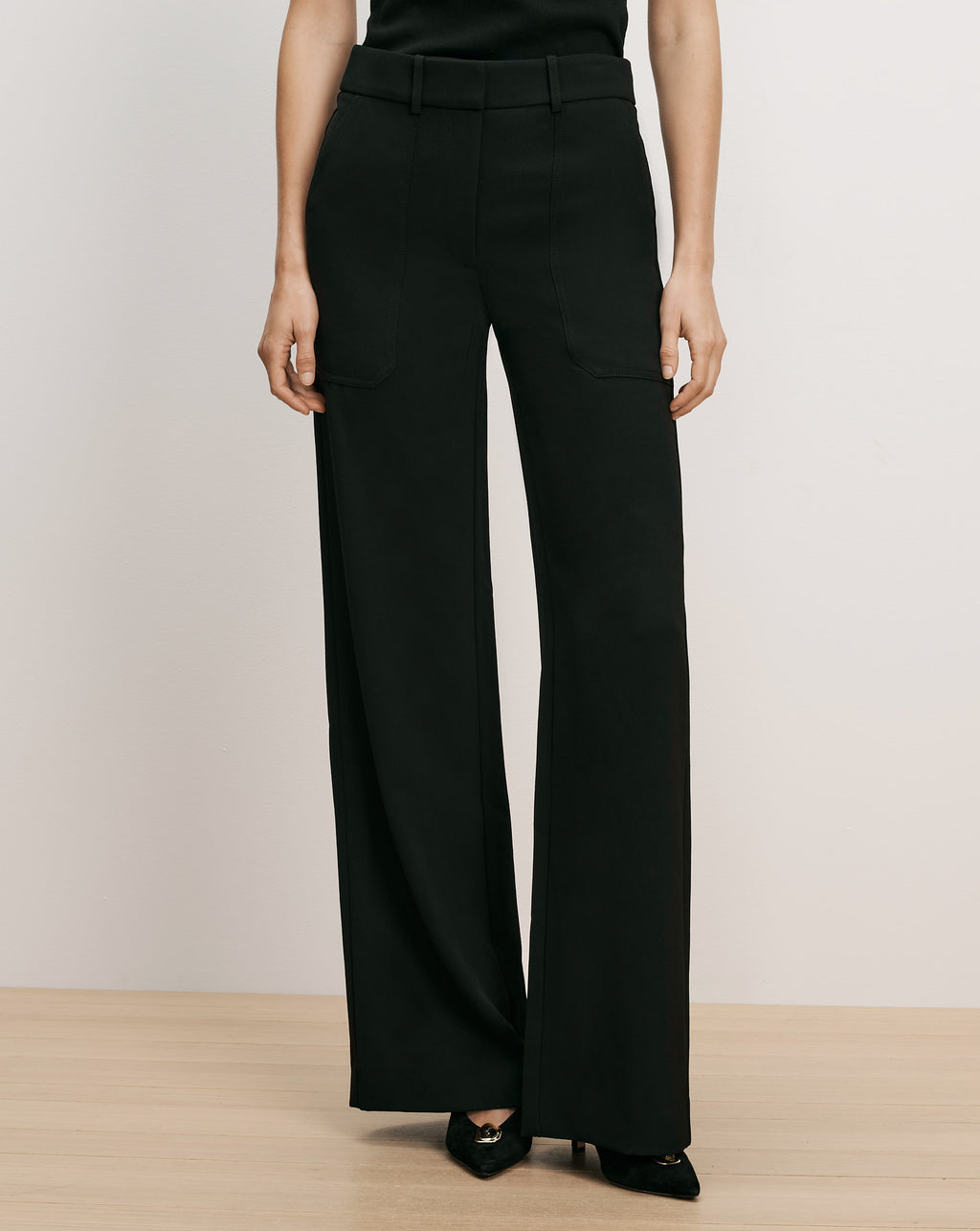 Veronica Beard Black wide-leg trousers with front patch pockets.