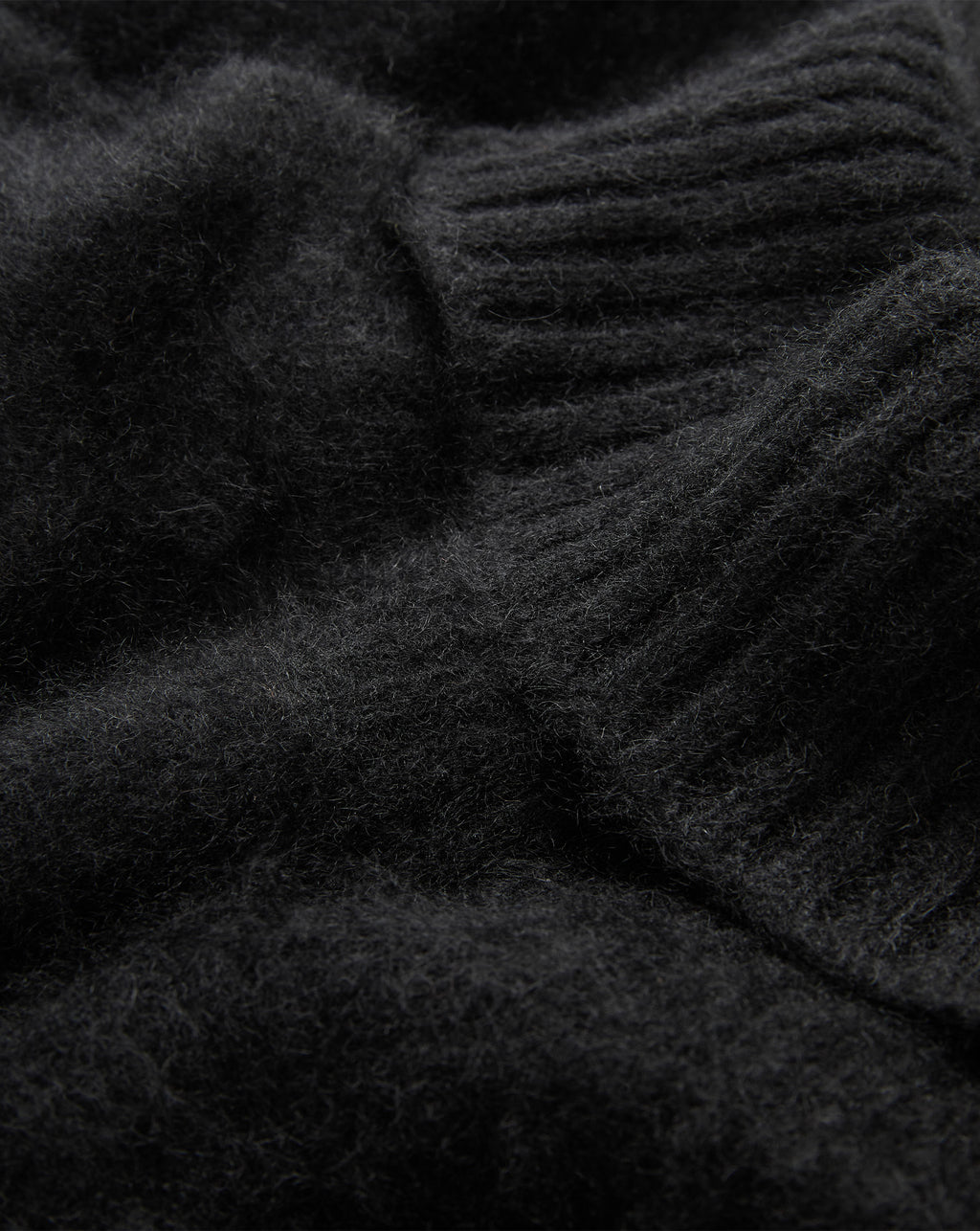 Veronica Beard Black fuzzy knit sweater with ribbed cuffs.