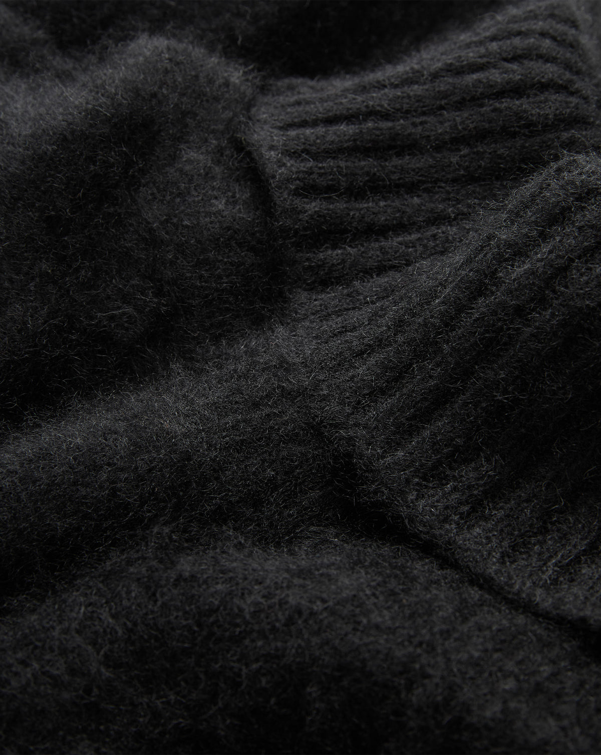 Veronica Beard Black fuzzy knit sweater with ribbed cuffs.
