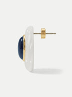 Veronica Beard Gold stud earring with white and navy blue stones.