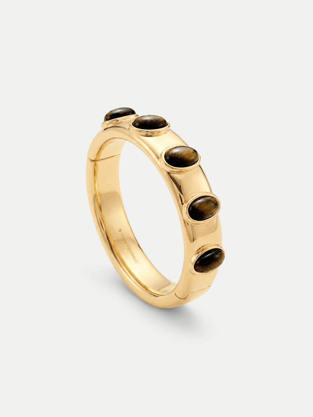 Veronica Beard Gold bangle bracelet with inset tiger eye stones.